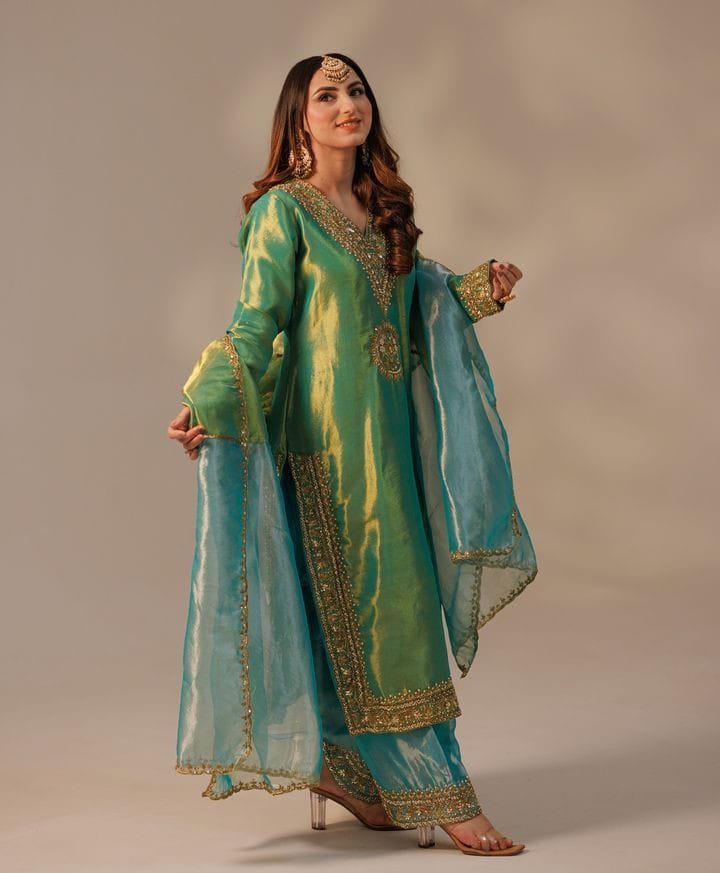 Silk Shimmer Turquoise and Green with Golden detailing, giving it a rich and luxurious appeal.with a Jimmy Choo-inspired finish features intricate sequins and thread embroidery.