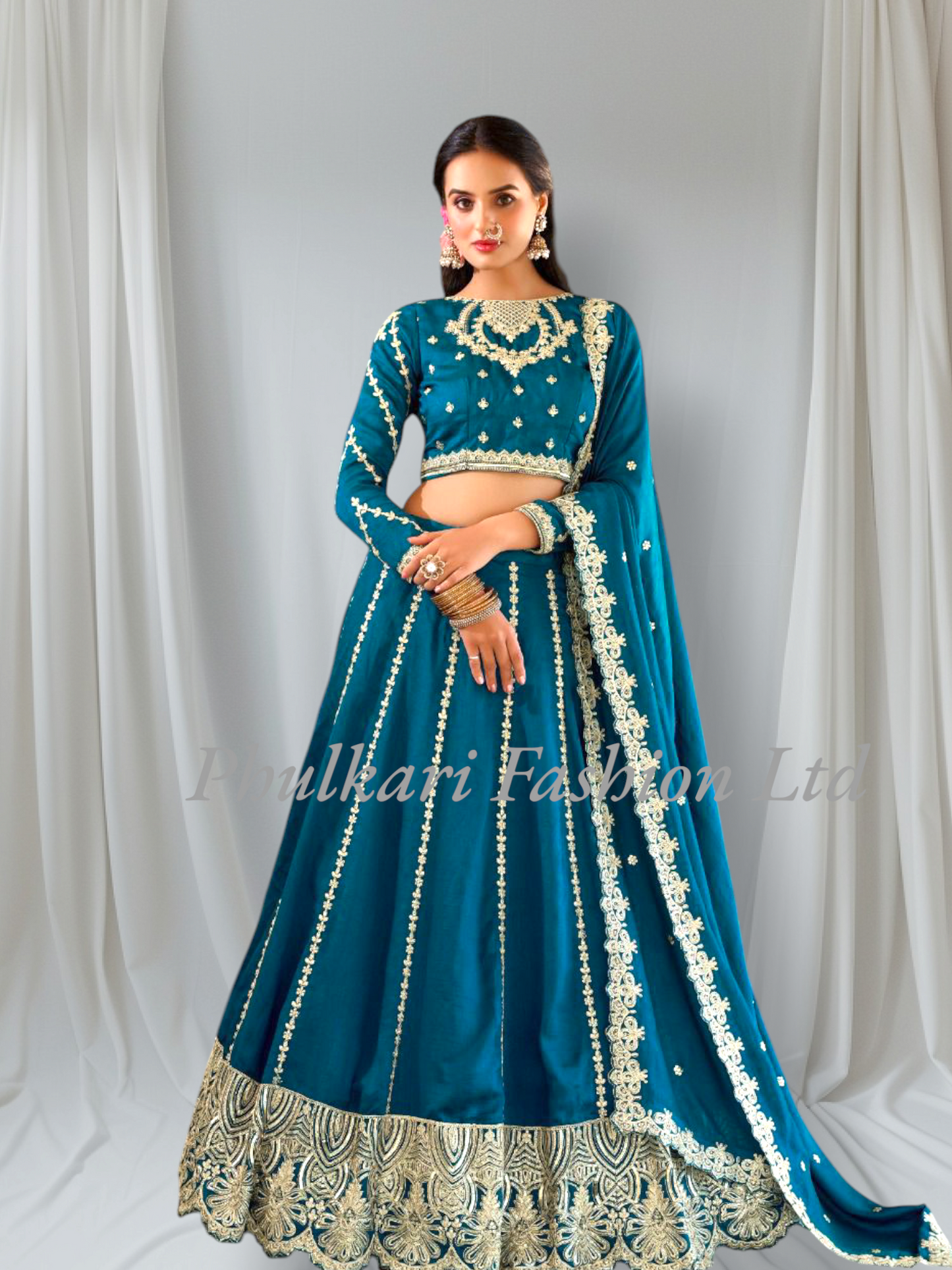 Wedding Firozi Lehnga and Choli fully stitched.