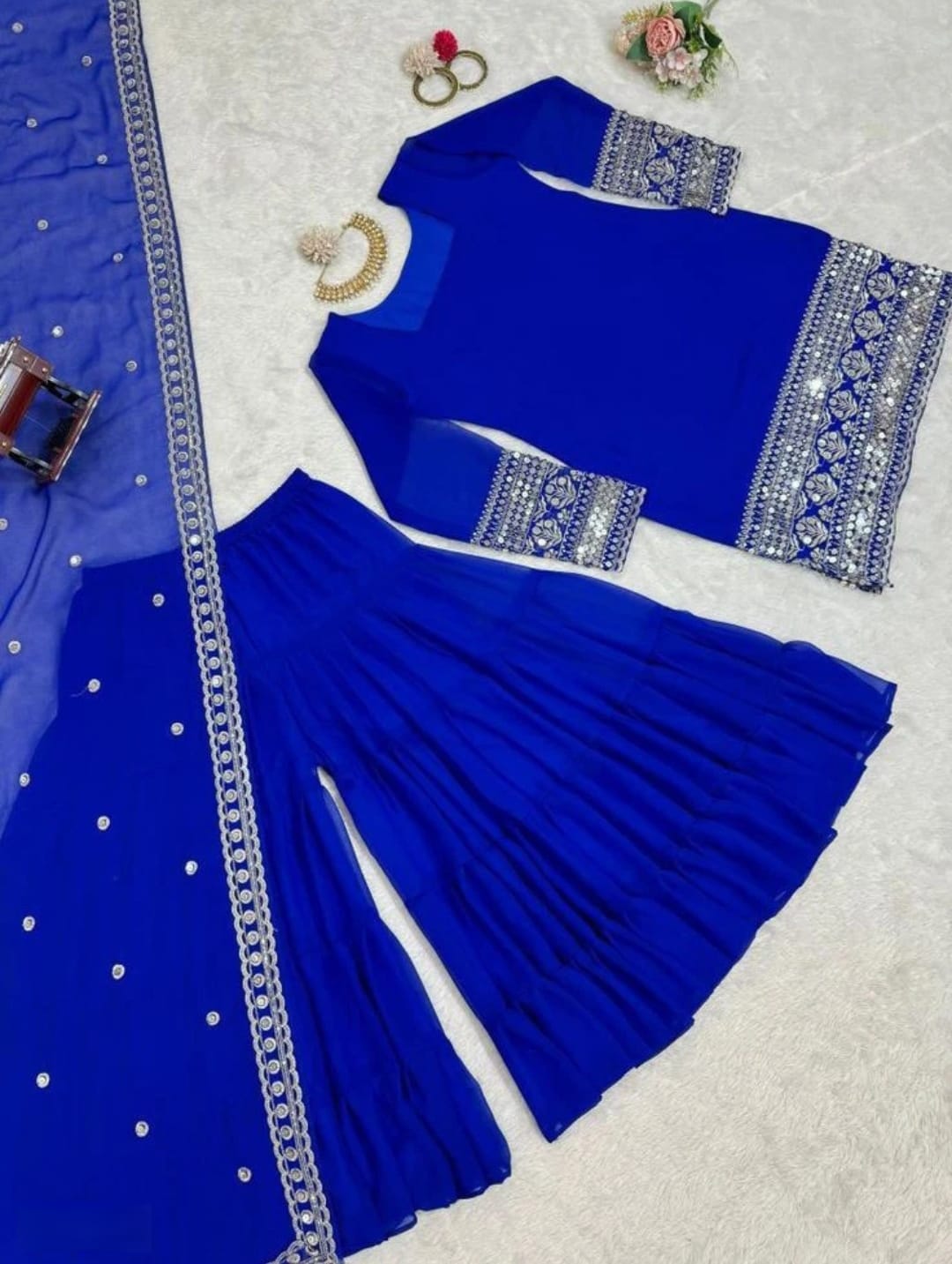 Stunning Suit Crafted From Heavy Faux Georgette Available In Pink & Royal Blue