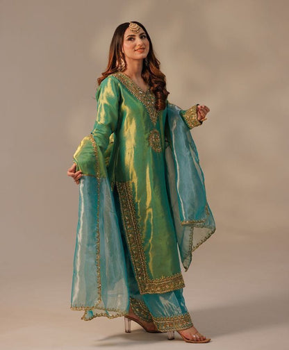 Silk Shimmer Turquoise and Green with Golden detailing, giving it a rich and luxurious appeal.with a Jimmy Choo-inspired finish features intricate sequins and thread embroidery.