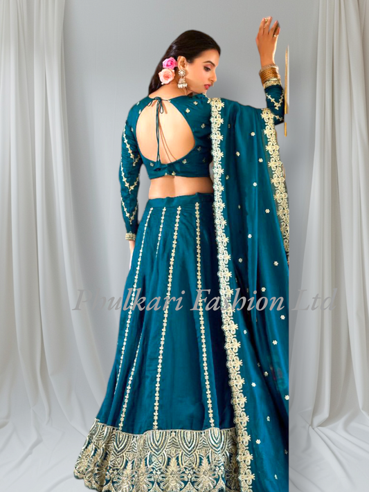 Wedding Firozi Lehnga and Choli fully stitched.